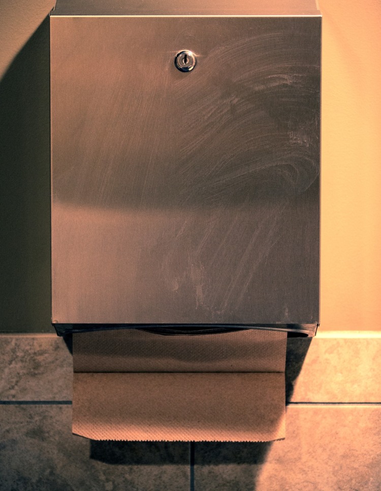 Image of an old paper towel dispenser